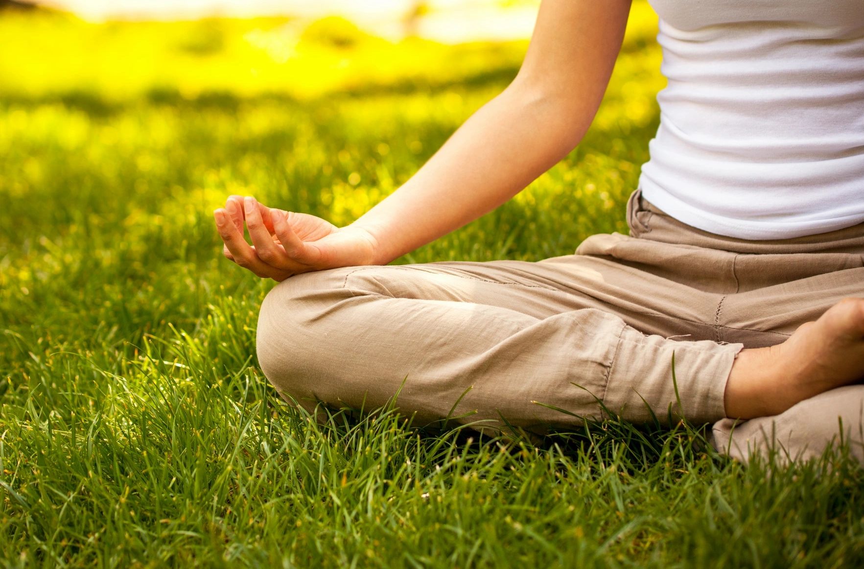 Person sitting peacefully in nature